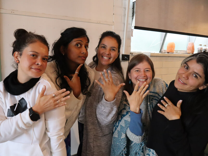 group of girls with handmade silver rings